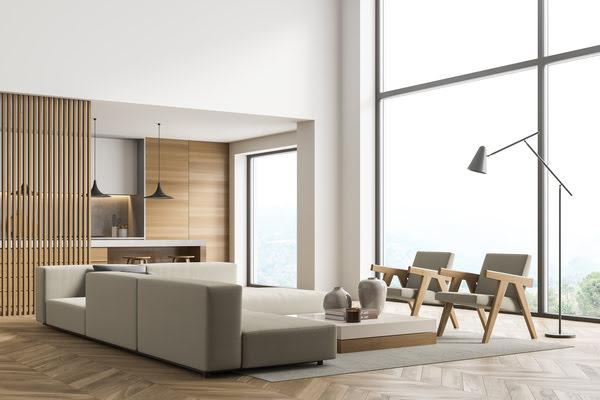 Minimalist living room with acoustic wooden wall partition panels dividing space and enhancing sound quality in open layout