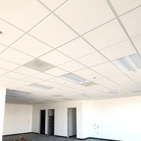 Acoustic ceiling grid in progress in a new office space