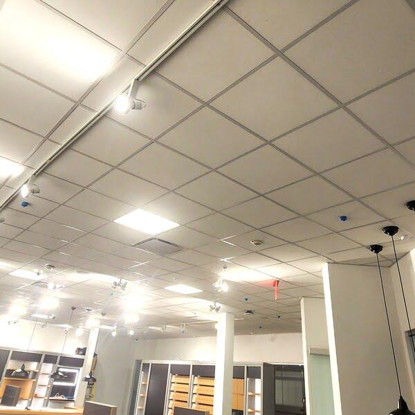 Ceiling tiles with track lighting in a retail store